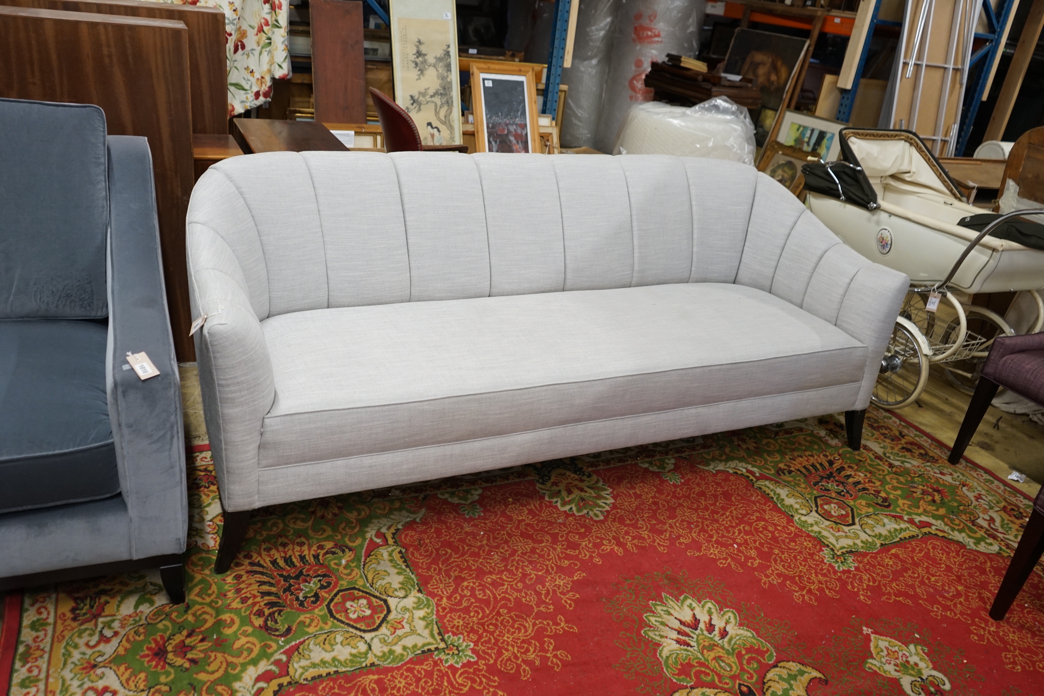 A Bray Design channel back settee in Sahco flint fabric, width 210cm, depth 84cm, height 83cm